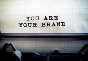 Feuille dans une machine à écrire portant la mention You are your brand